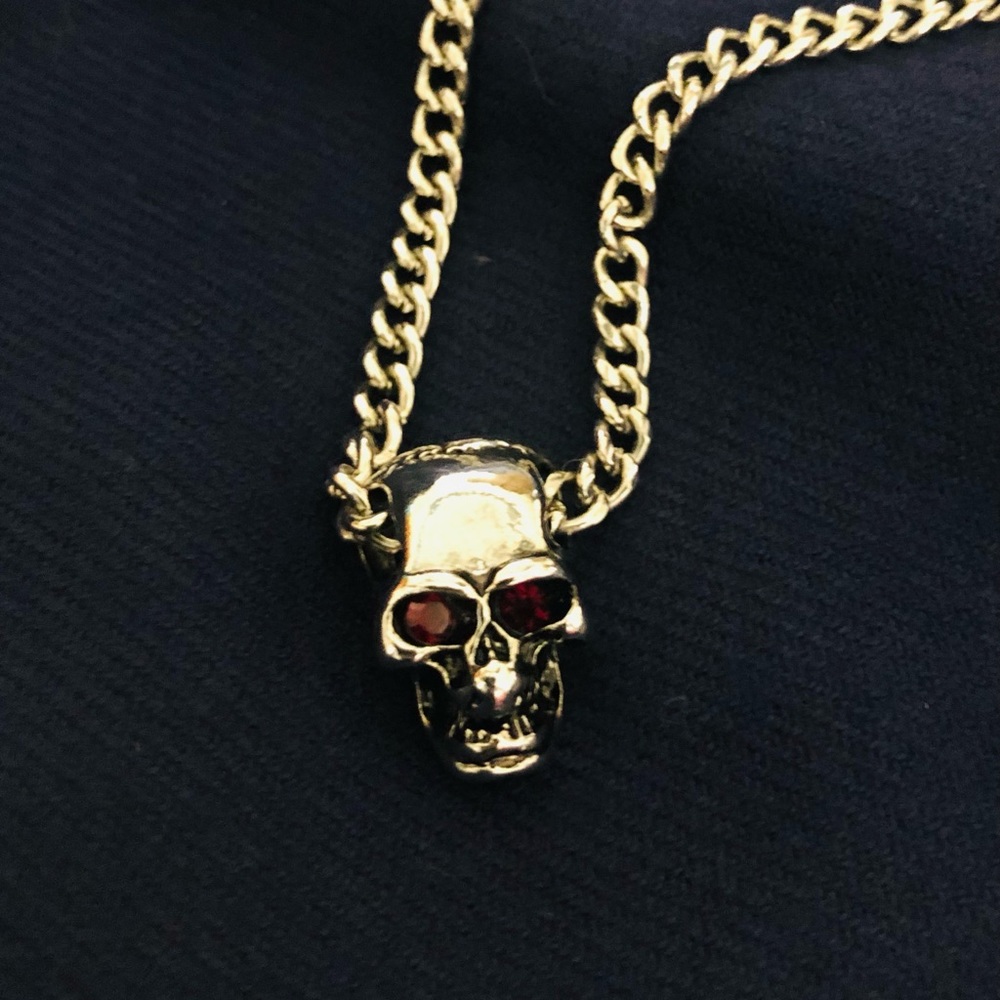Silver ruby skull necklace